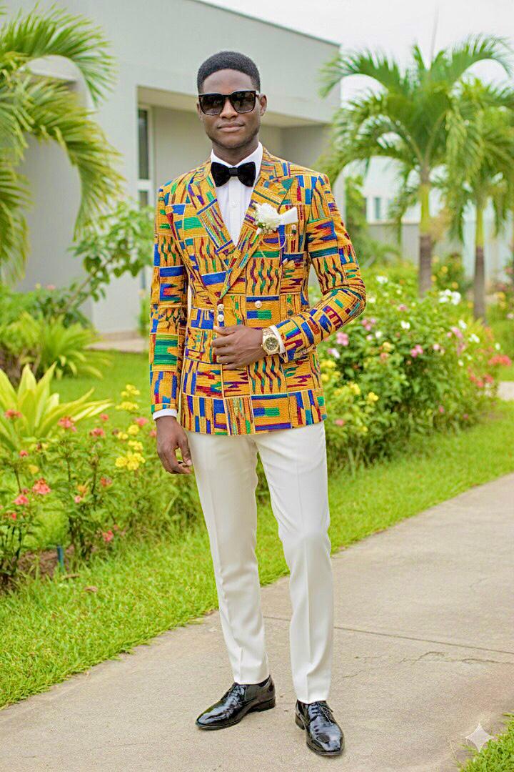 Miracle Aneke in a formal outfit-professional photo for biography use